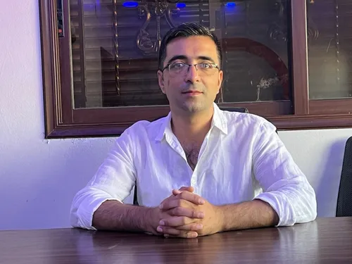 Mohammed Osman is sitting